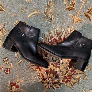 Black leather over-the-ankle boots with zipper